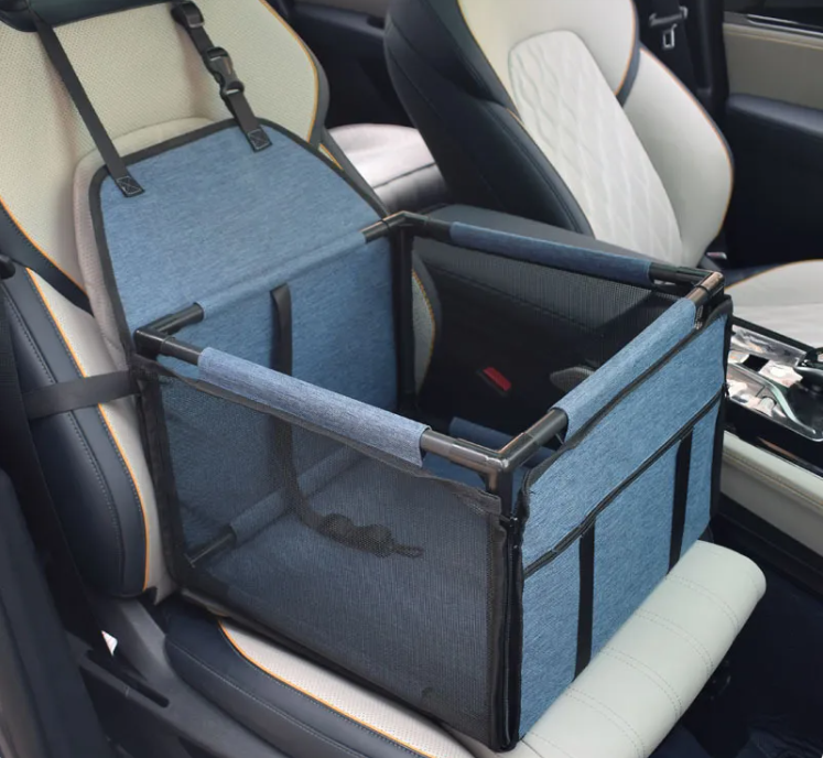 Navy blue FurFree pet car seat and travel bed installed in a vehicle