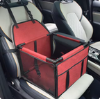 Bright red FurFree pet car seat and travel bed installed in a vehicle